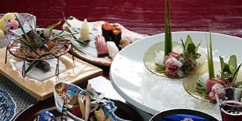Kaiseki Cuisine "Goku" - An exquisite twelve-course meal featuring Hassun and Grilled Dishes made with seasonal ingredients.