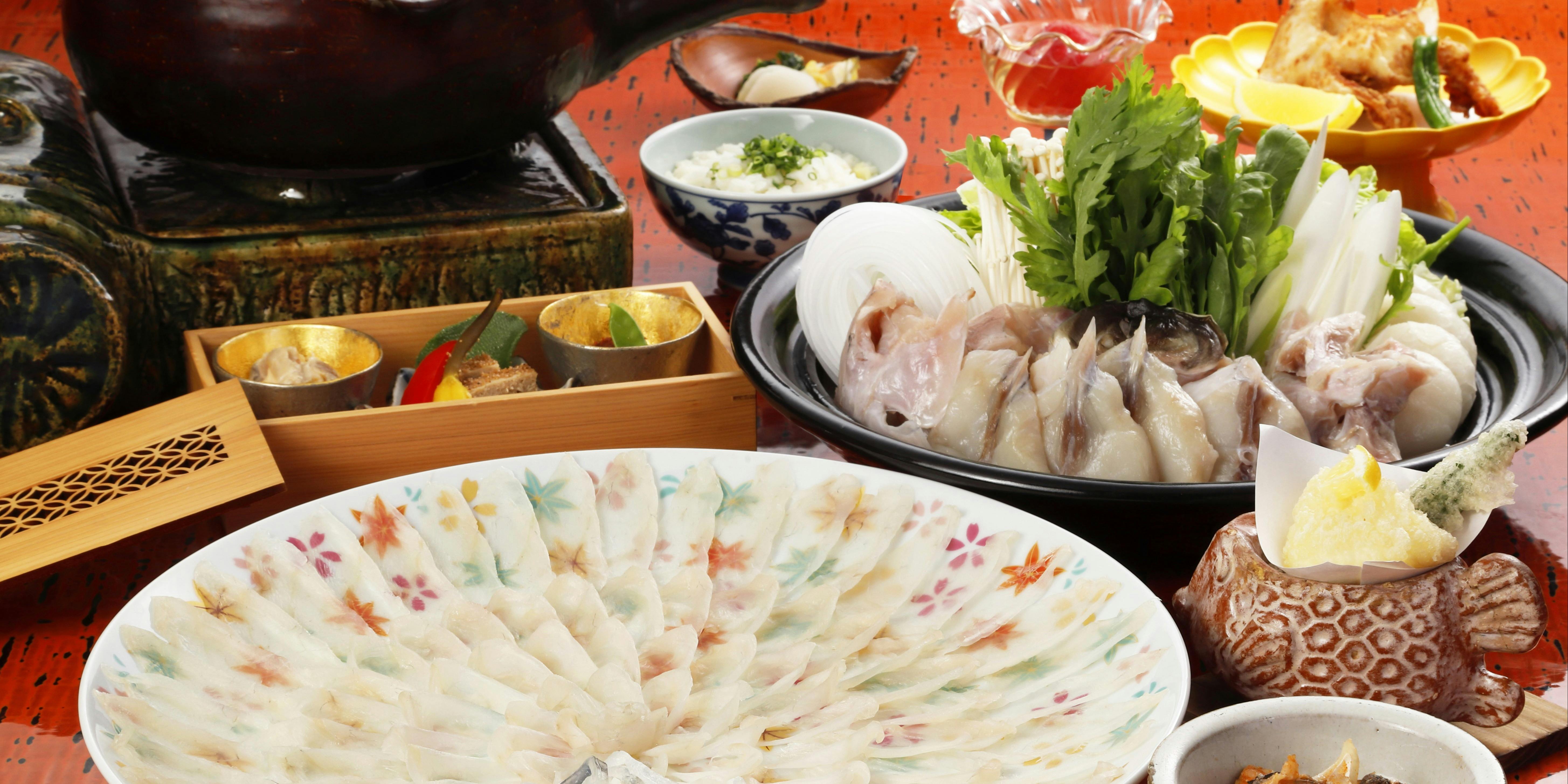 【老虎河豚套餐】包含老虎河豚刺身、炸老虎河豚、老虎河豚白子共8道菜。