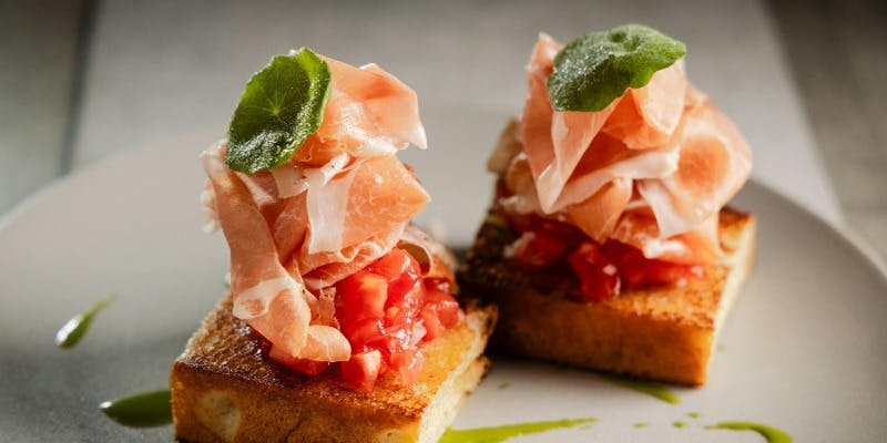 A 10-dish course featuring a variety of appetizers and warm dishes, presented in smaller portions.