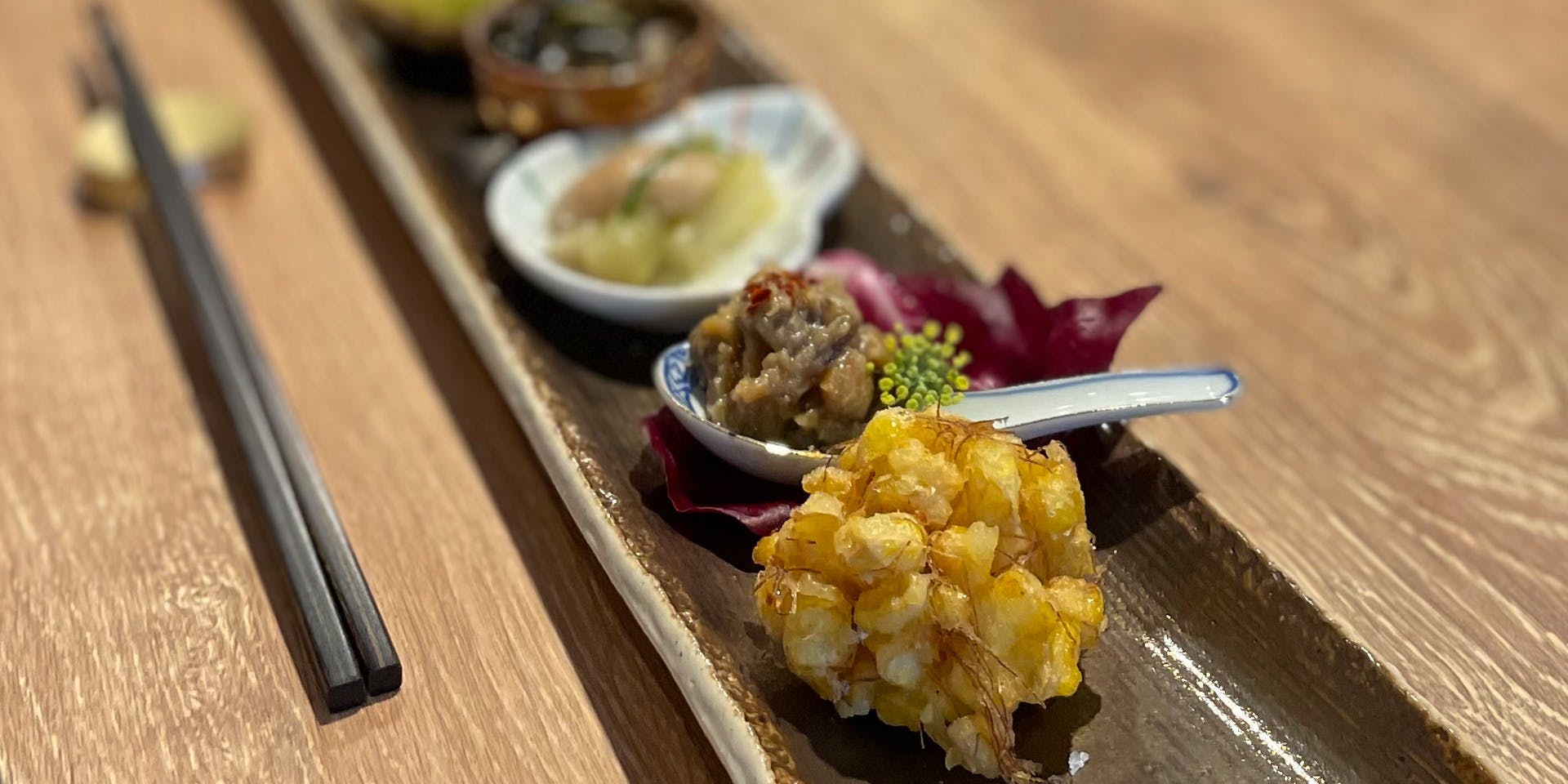 Omakase Course: Seasonal vegetables from Higashimura, snacks to pair with sake, and fresh fish dishes.
