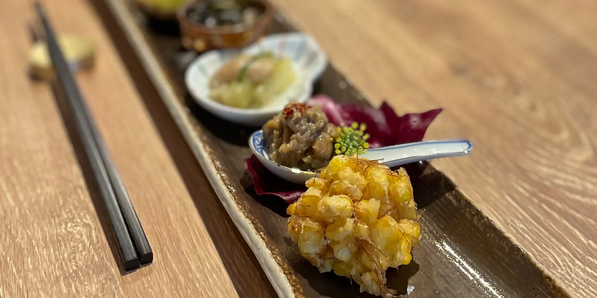 Omakase Course: Seasonal vegetables from Higashimura, snacks to pair with sake, and fresh fish dishes.