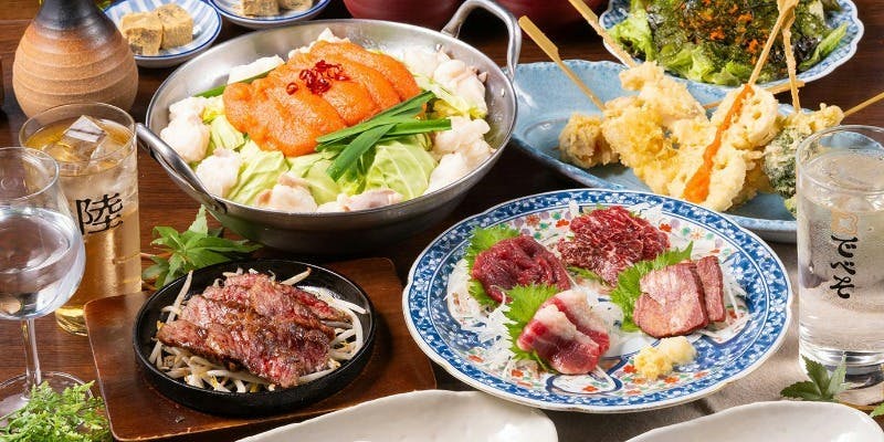 Indulge in the luxurious "Wagyu Steak Course" featuring 8 exquisite dishes, including premium Wagyu beef, cod roe motsunabe, and horse sashimi.