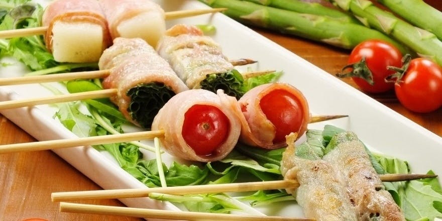 Kiku Course - A total of 9 dishes including premium skirt steak and meat sushi.