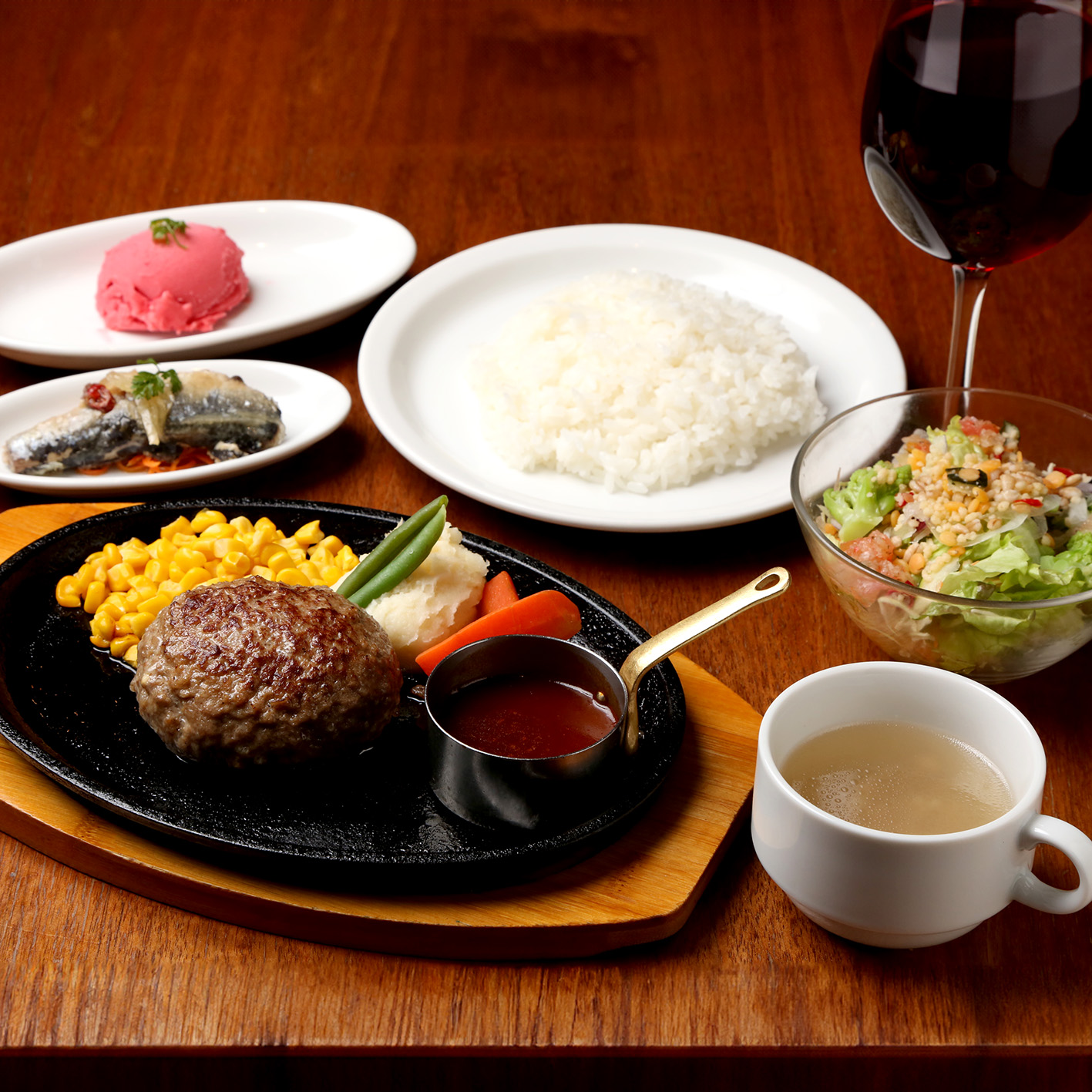 The "Short Course Plan" available for individuals includes an appetizer, salad, specialty hamburger, and dessert with coffee.